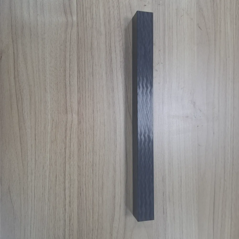 Square carbon fiber bar profile with a matte twill finish Square carbon fiber bar profile with a matte twill finish